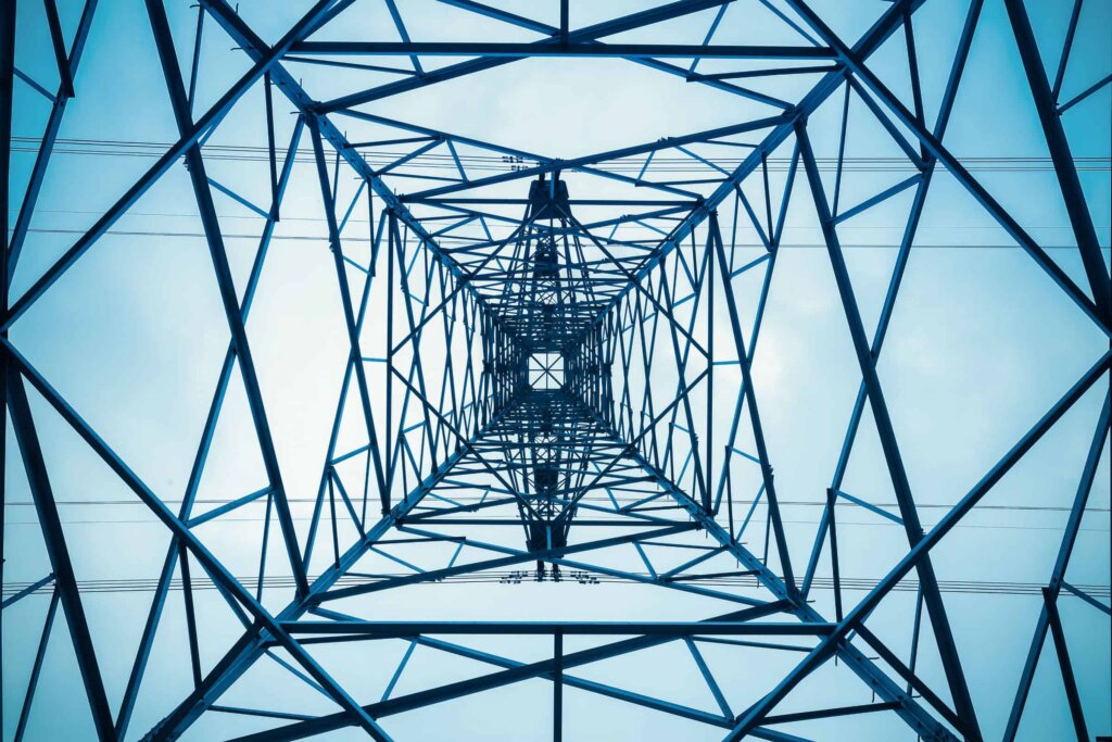 Electric pilon tower, view from the inside looking up.