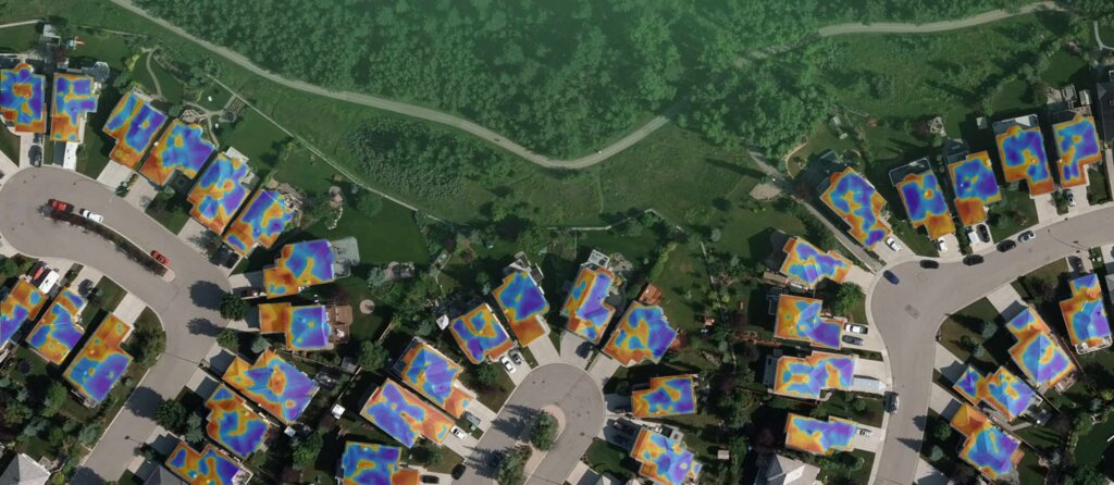 Aerial shot showing thermal energy released by residential homes.