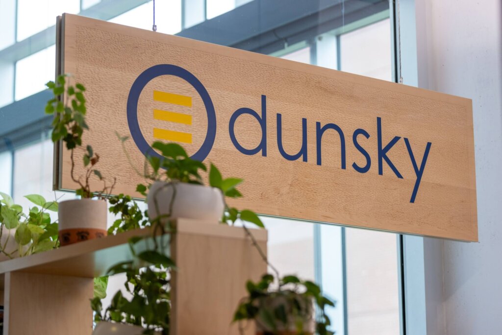 Dunsky logo on wood panel in the Montreal office