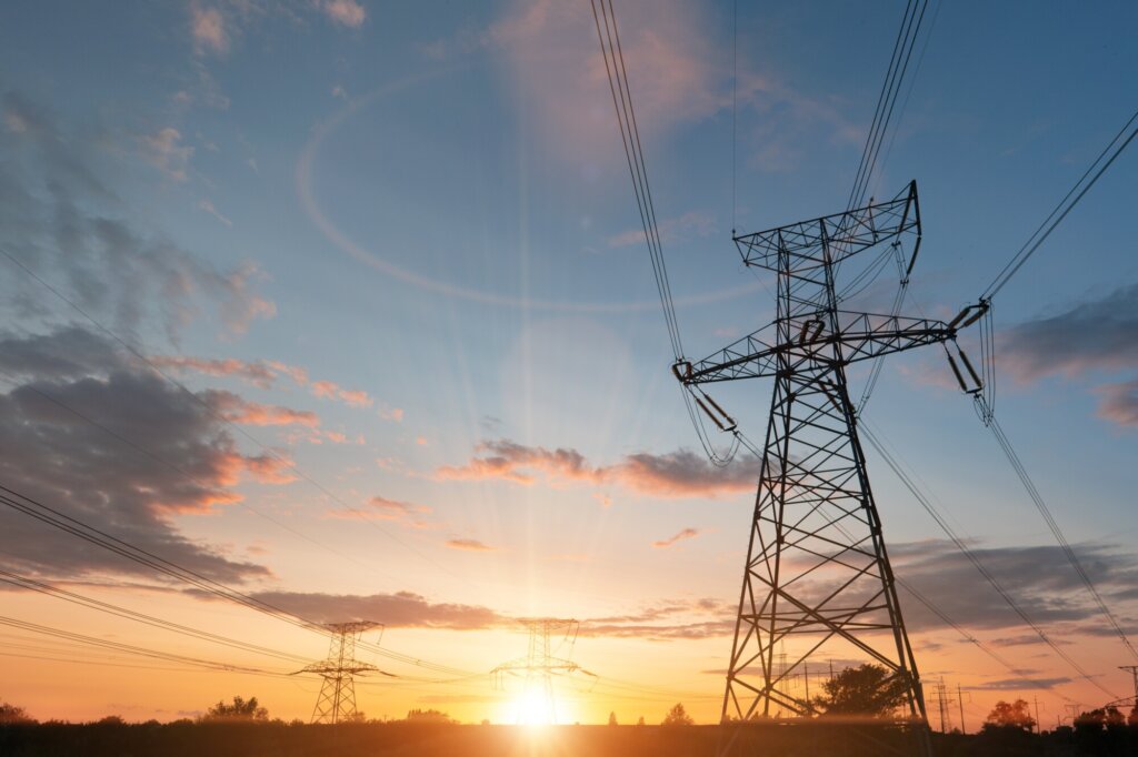 Transmission tower overlooking sunset